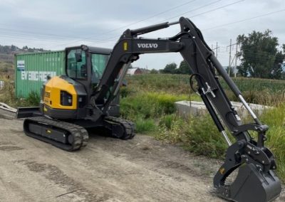 Toncar digger and green bin