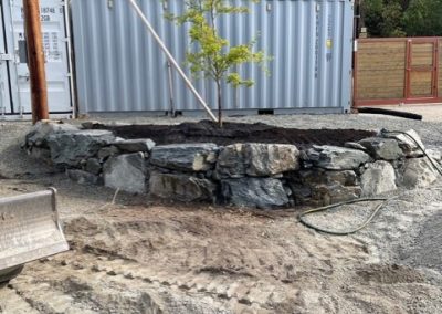 Toncar stone wall around garden near beach