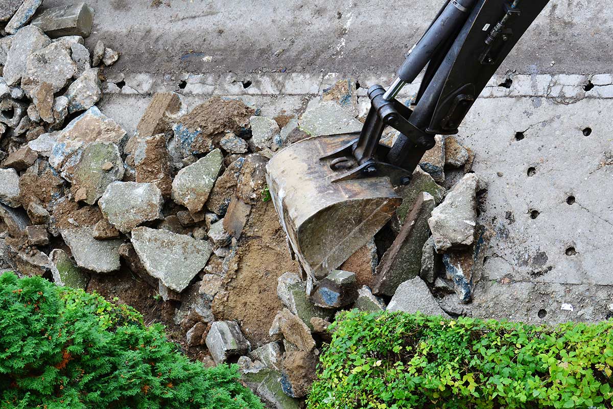 excavating machine digging up the road2